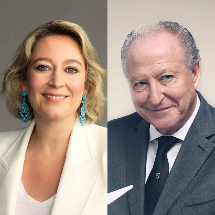Portret dwoch osob: kobietę z blond włosami w białym żakiecie oraz mężczyznę w szarym garniturze, oboje uśmiechnięci.