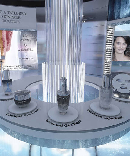 A modern skincare display featuring Lancome products, including Genifique Eye Cream, Advanced Genifique, and Genifique Light Pearl. The background includes promotional graphics and an image of a woman.
