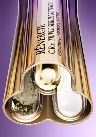 Flacon de ser cu retinol, design elegant, cu două compartimente și text aurit pe fundal violet.